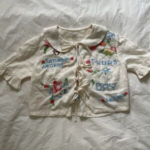 Kimchi Blue Embroidered Tie-Front Days of The Week Peter Pan Collar Top